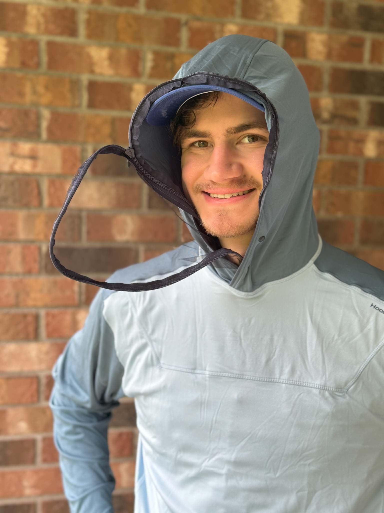 Hoodie360 with partially zipped face screen