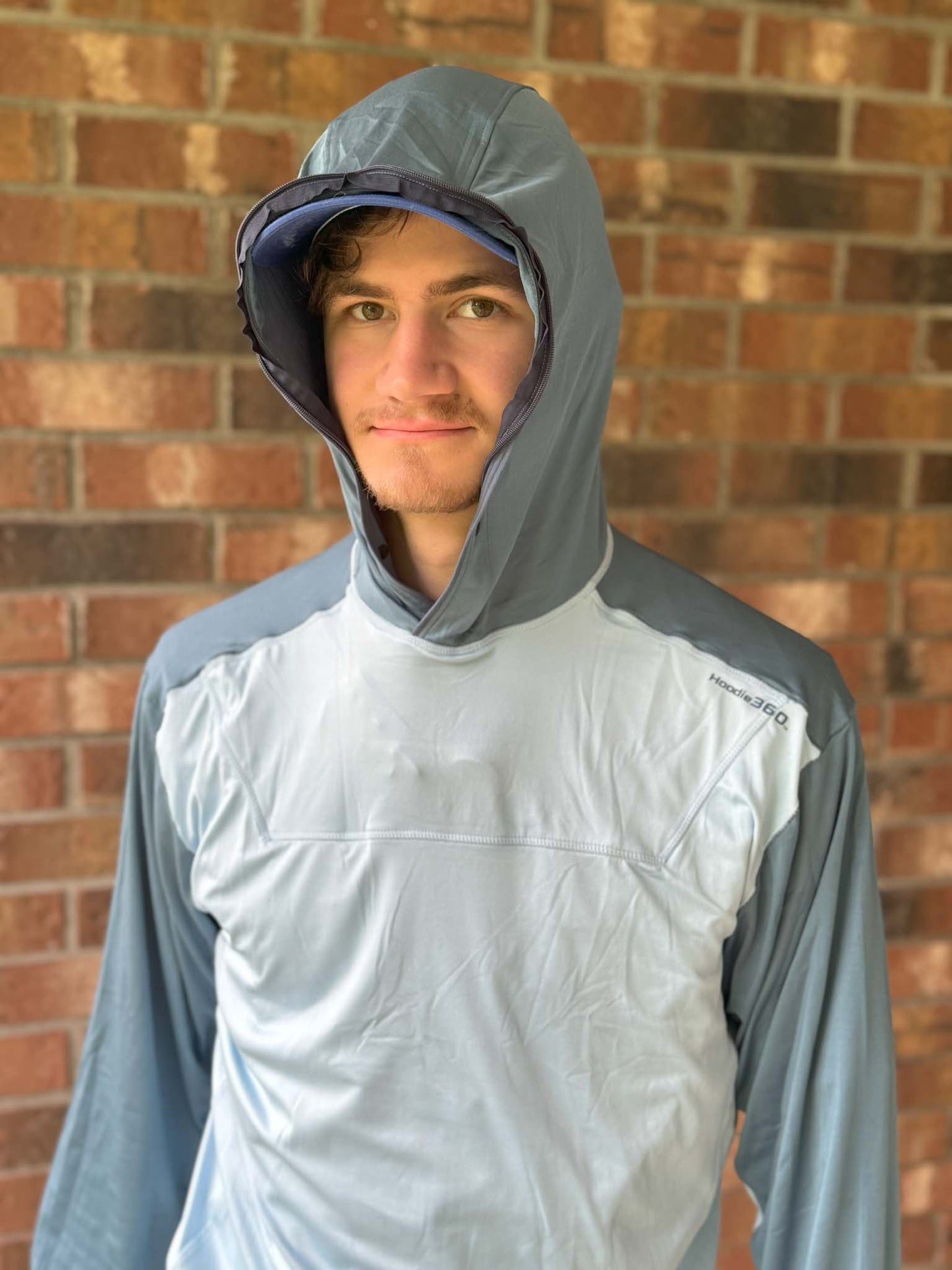 Hoodie360 with facescreen  stored in chest pocket